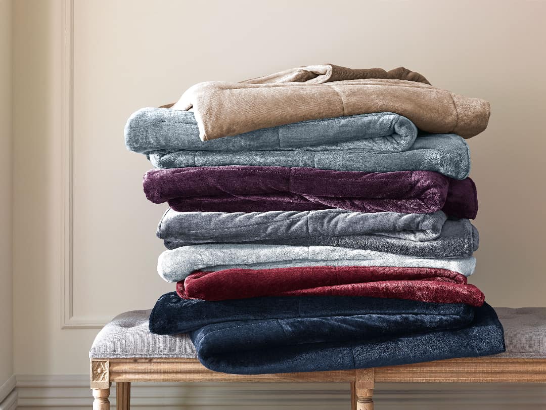Stack of Vellux blankets.
